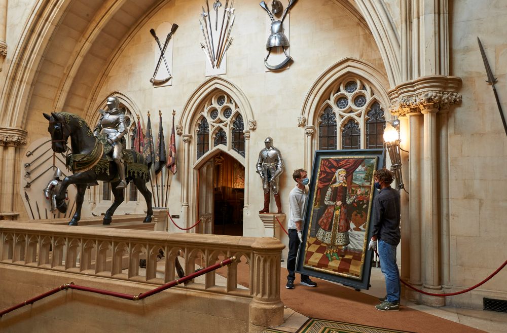 The portraits are transported up the Castle’s Grand Staircase and into the King’s Dining Room, where they will be on display to the public.